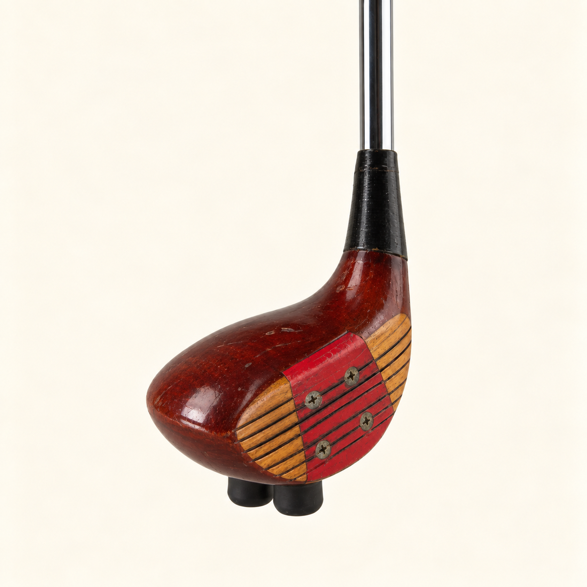Crimson Classic reconstructed wider face view with red insert, chrome shaft and two rubber feet on cream background.
