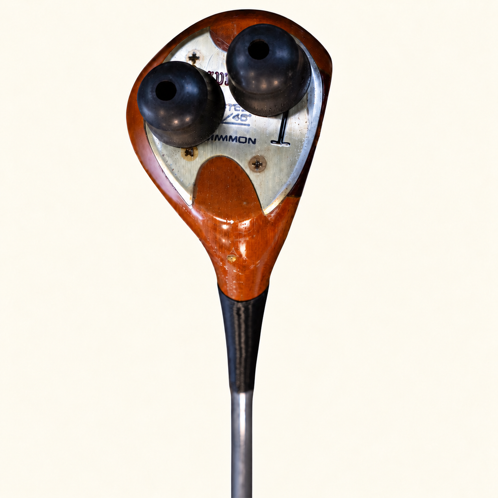 The Old Sport club head underside showing two black rubber grips on a cream background