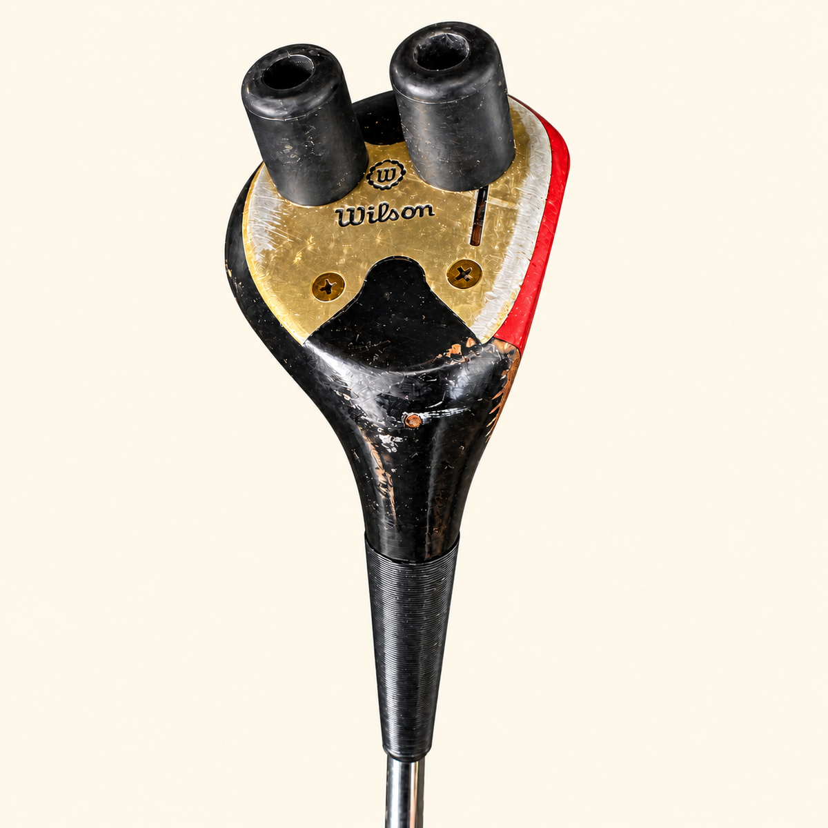 Model 20 club head sole close-up on a cream background