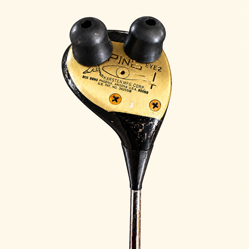 Model 7 club head sole close-up on a cream background